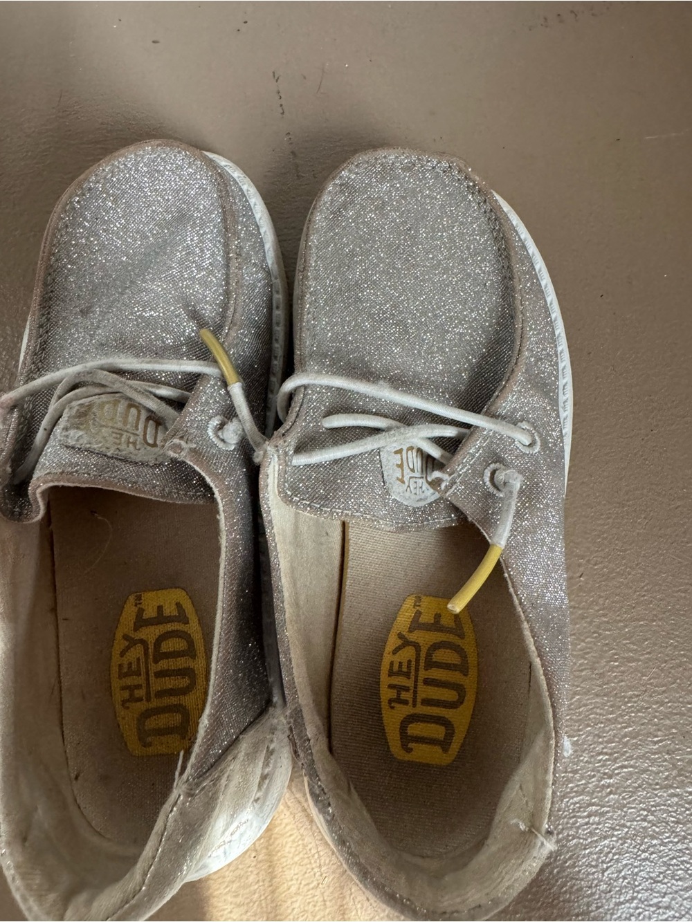 Hey Dude Kids Glitter Slip-Ons in Silver with Yellow Accents